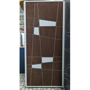 Pannello Trap per Porta Blindata Noce Pantografato con Inserti Moderni 2